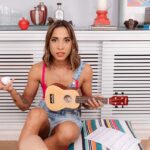Cassia Fernandez cute trans girl playing guitar